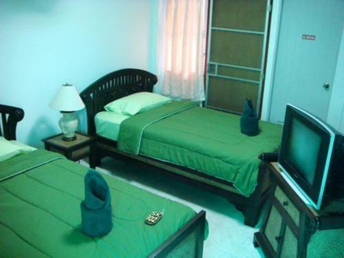 Hostel Junior House Čiang Mai Pokoj fotografie