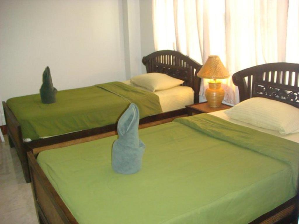 Hostel Junior House Čiang Mai Pokoj fotografie